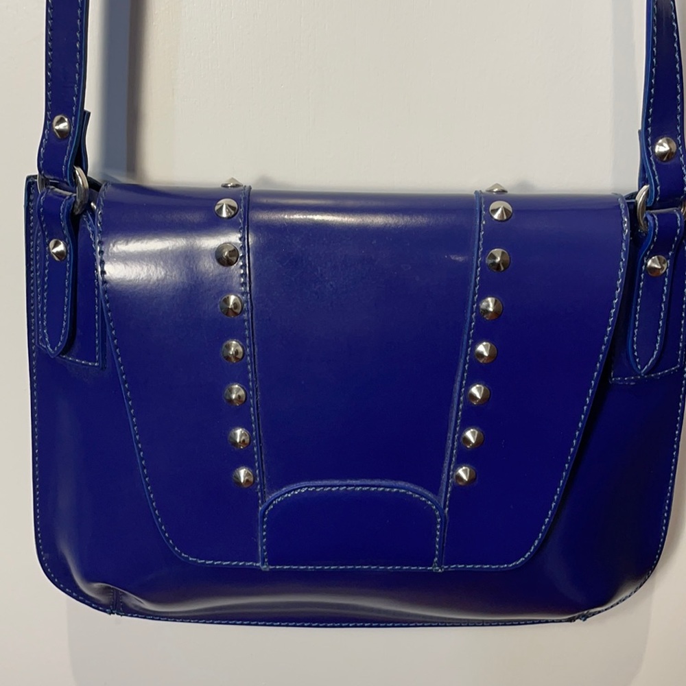 Varrlale made in Italy crossbody bag in cobalt blue with silver studs .